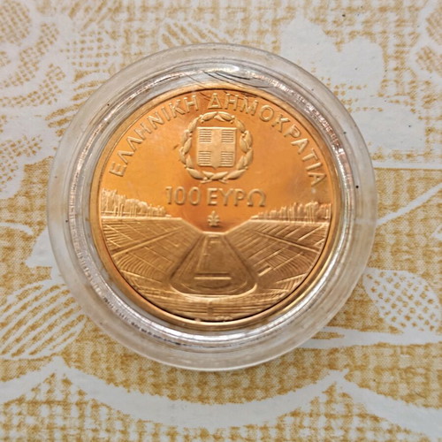 Gold coin 100 euros like new from Athens 2011 Paralympic Games