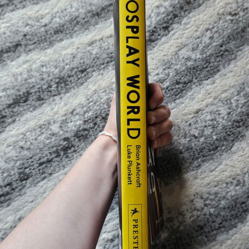 Cosplay World book used with slight cover damage