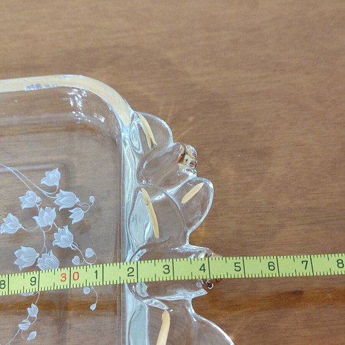 Glass serving platter used with gold handles and painted flowers