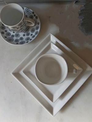 Modern cups in black and white shades like new