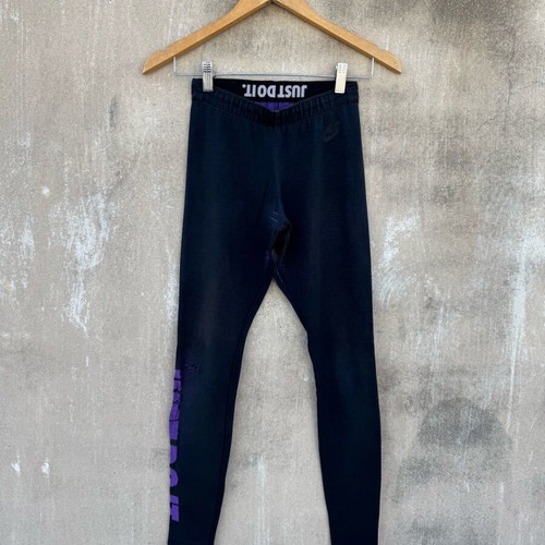 Nike legging used with knee defect, black and purple, size S