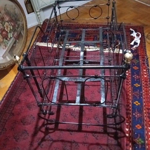 Baby cradle old handmade iron with bronze details refurbished