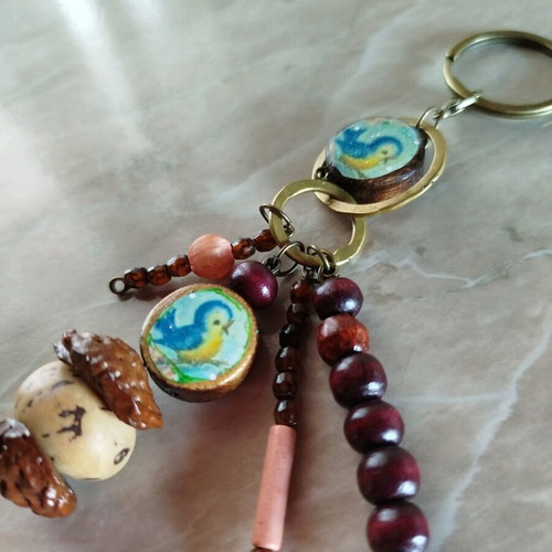 Purse charm keychain new, handmade with wood beads and almond shells