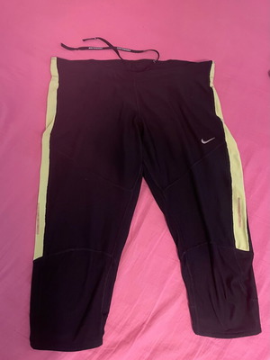 Nike Dri-Fit athletic capri leggings like new, black with yellow stripes