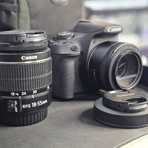 Canon EOS 2000D DSLR camera kit like new with 50mm f/1.8 STM and 18-55 IS lenses