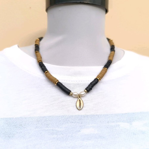 Women's summer necklace with a clasp, pearls, and matte gold metallic shell
