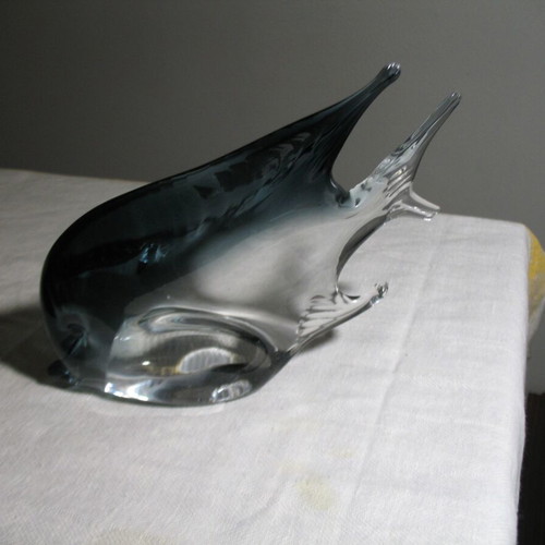 Glass decorative fish used with small tail chip