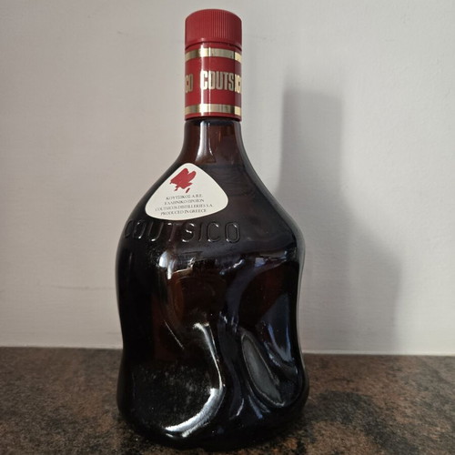 Coutsico vintage mango liqueur bottle, sealed
