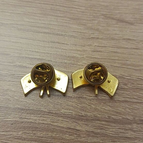 Lapel pins used with Greece and Panama flags