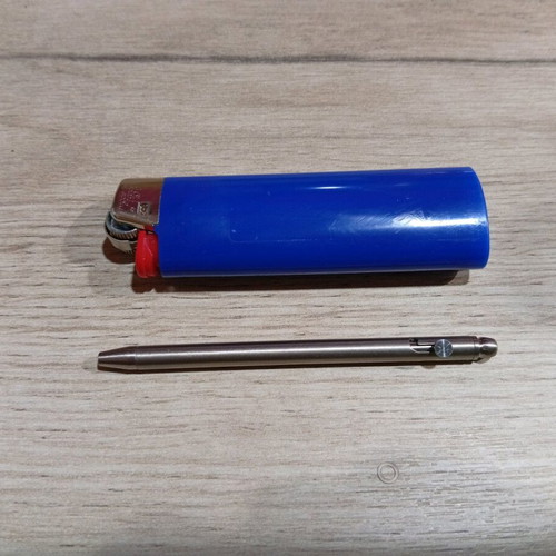 Mini titanium pen like new