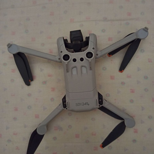 DJI Mini 3 Pro drone with two controllers and accessories