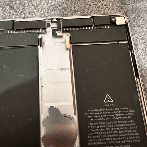 iPad Pro back cover with spare parts and battery