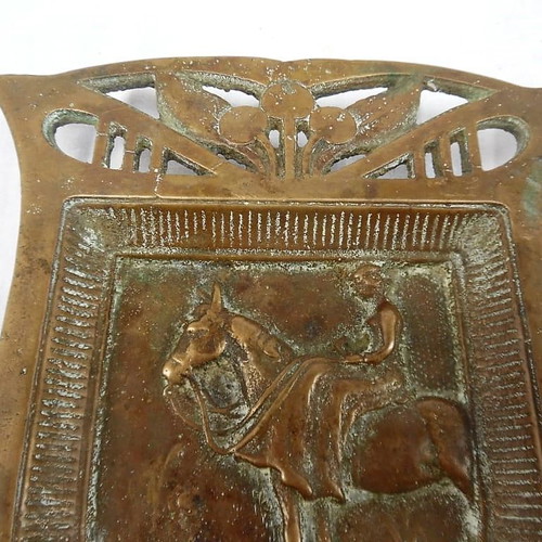 Large solid brass carved ashtray with embossed figure