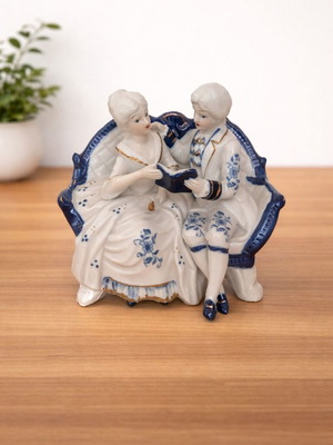 Vintage couple figurine reading on sofa rococo style like new