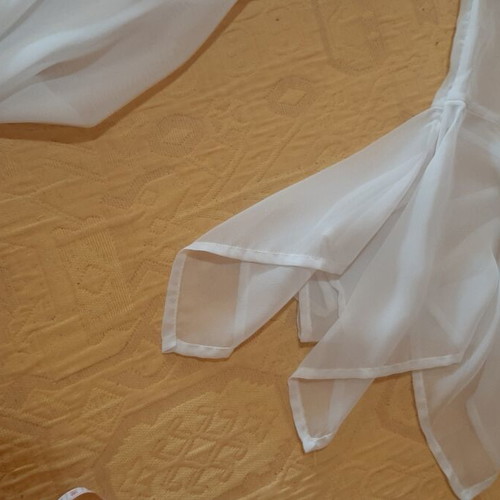 White women's shirt like new, asymmetrical with bows and cords