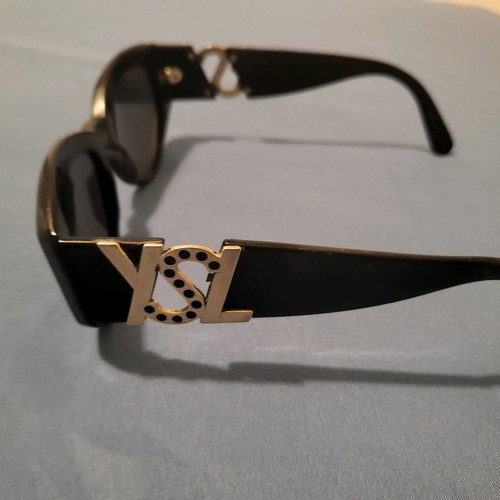 Yves Saint Laurent sunglasses used, black with gold logo