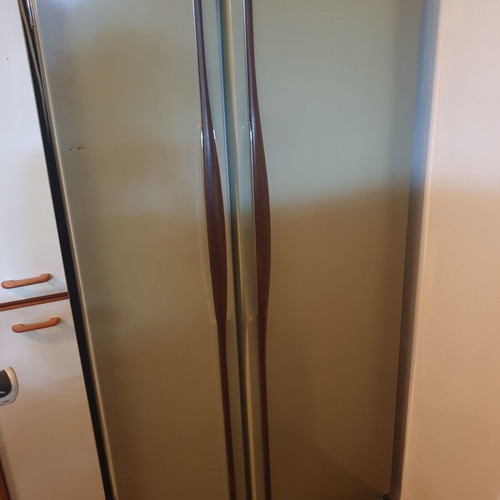 Vintage 1970s home appliance set used, General Electric fridge, Kenmore stove, Ariston washer