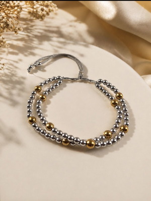 Double bracelet with silver and gold hematite beads, adjustable cord