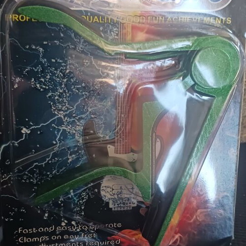 Green capo for acoustic guitar new