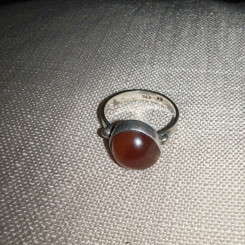 Silver ring used with gold and possible carnelian stone