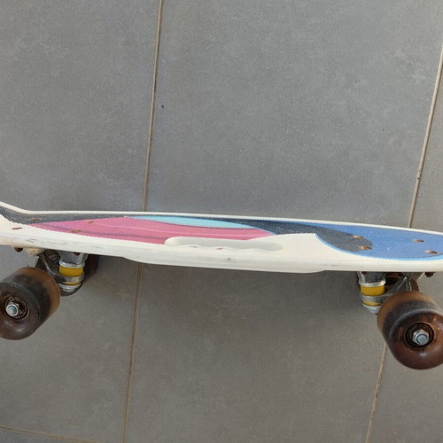 Skateboard used with light-up wheels and protective gear