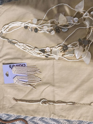Necklace bracelet and earrings set used, white
