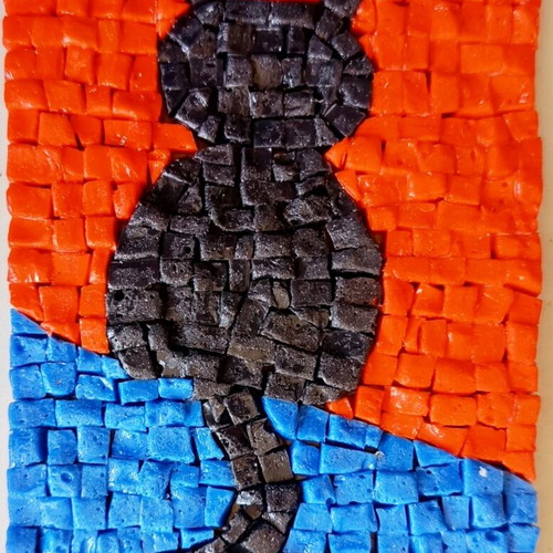 Mosaic framed artwork with black cat design