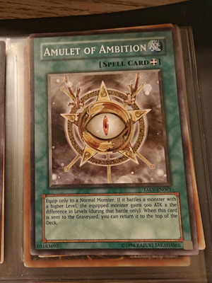 Yu-Gi-Oh card Amulet of Ambition like new
