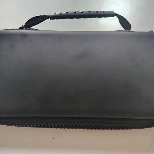 Nintendo Switch console with accessories and carrying case