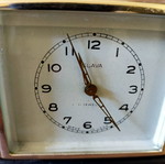 Slava mechanical table clock used, analog display