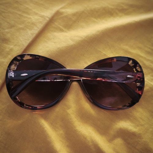 Sunglasses used, brown