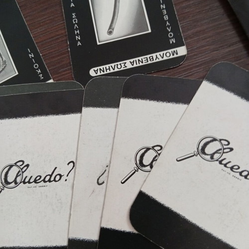 Cluedo 1980s game contents used, includes cards, dice, and murder folder