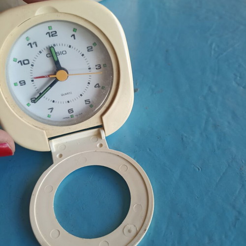 Casio portable alarm clock used, analog display