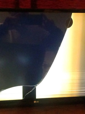 LG 28TK430V-PZ TV for parts, used, damaged screen