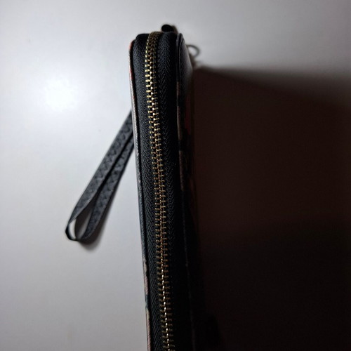 Women's black wallet with designs like new