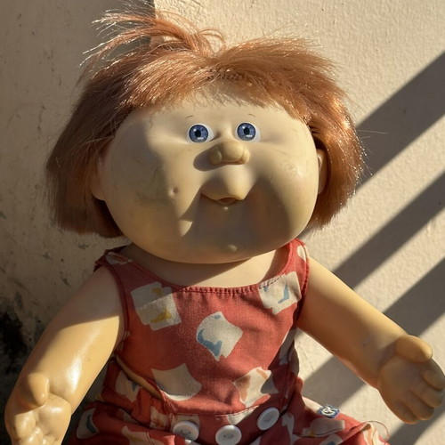 Vintage Cabbage Patch Kids doll used with clothes