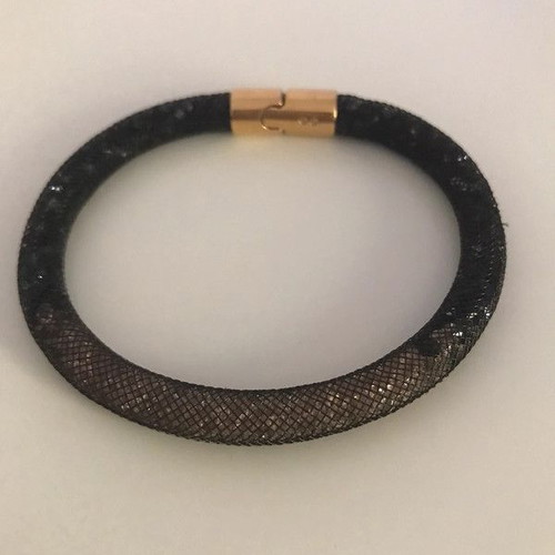 Swarovski women's bracelet like new, black and brown