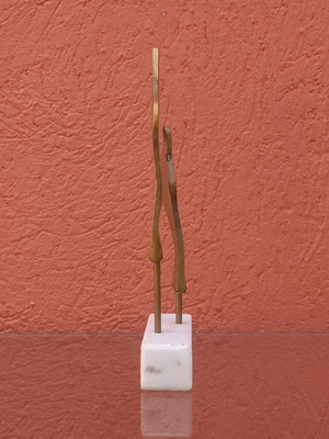 Brass sculpture used on marble base