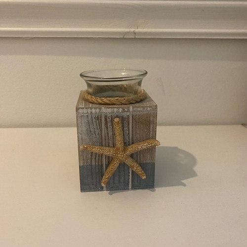 Candlestick with starfish decoration