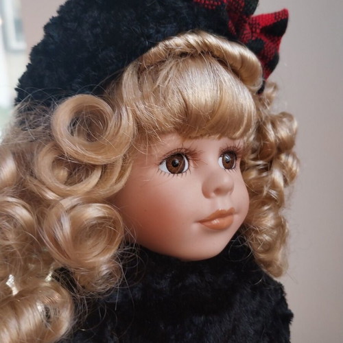 Vintage porcelain doll winter like new from Collector's Choice collection