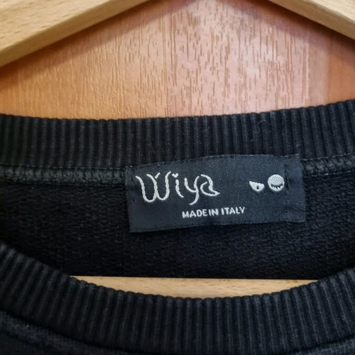 Black sweatshirt used with unique sleeves and asymmetrical design