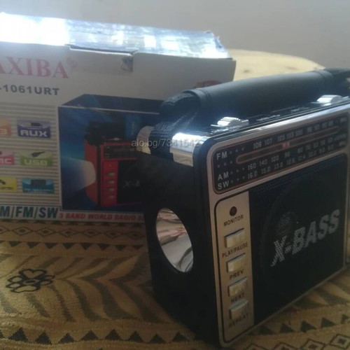 Portable rechargeable radio with flashlight, MP3, USB, SD card, green