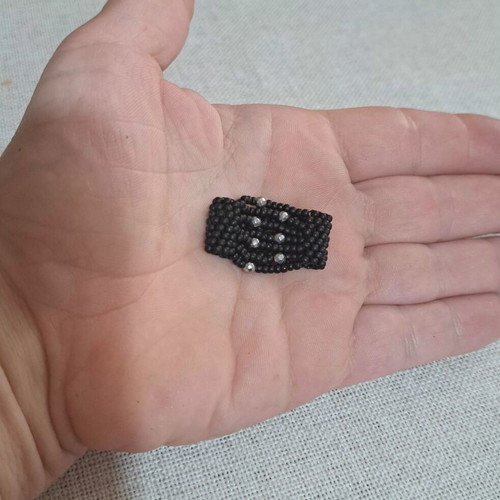 Handmade ring with black matte and silver polyhedral beads