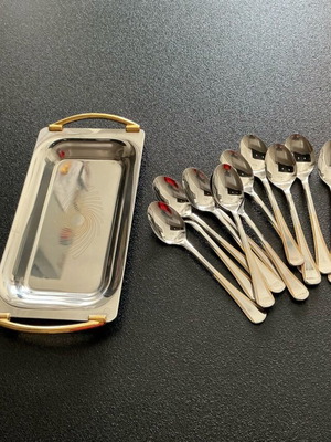 Tray with 12 unused 18/8 stainless steel Amefa dessert spoons like new