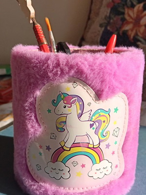 Fluffy pink pencil holder with unicorn design