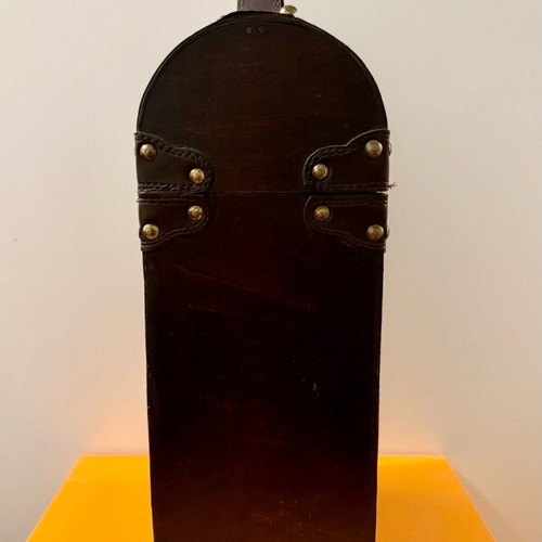 Decorative wooden case used with leatherette for bottle storage