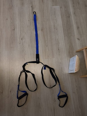 TRX strap used, blue color without ceiling hook