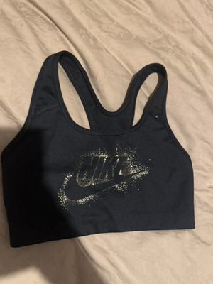 Nike top size S black with gold letters like new