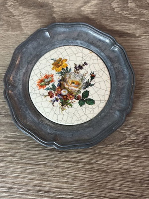 Vintage pewter and ceramic coaster used with floral design