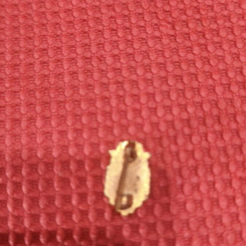 Vintage lapel pin shield with cross and white enamel